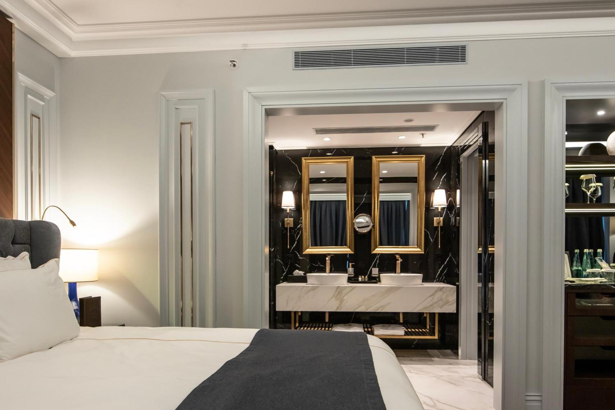 Xheko Imperial Luxury Hotel & Spa Tirana Exterior photo A suite at the hotel