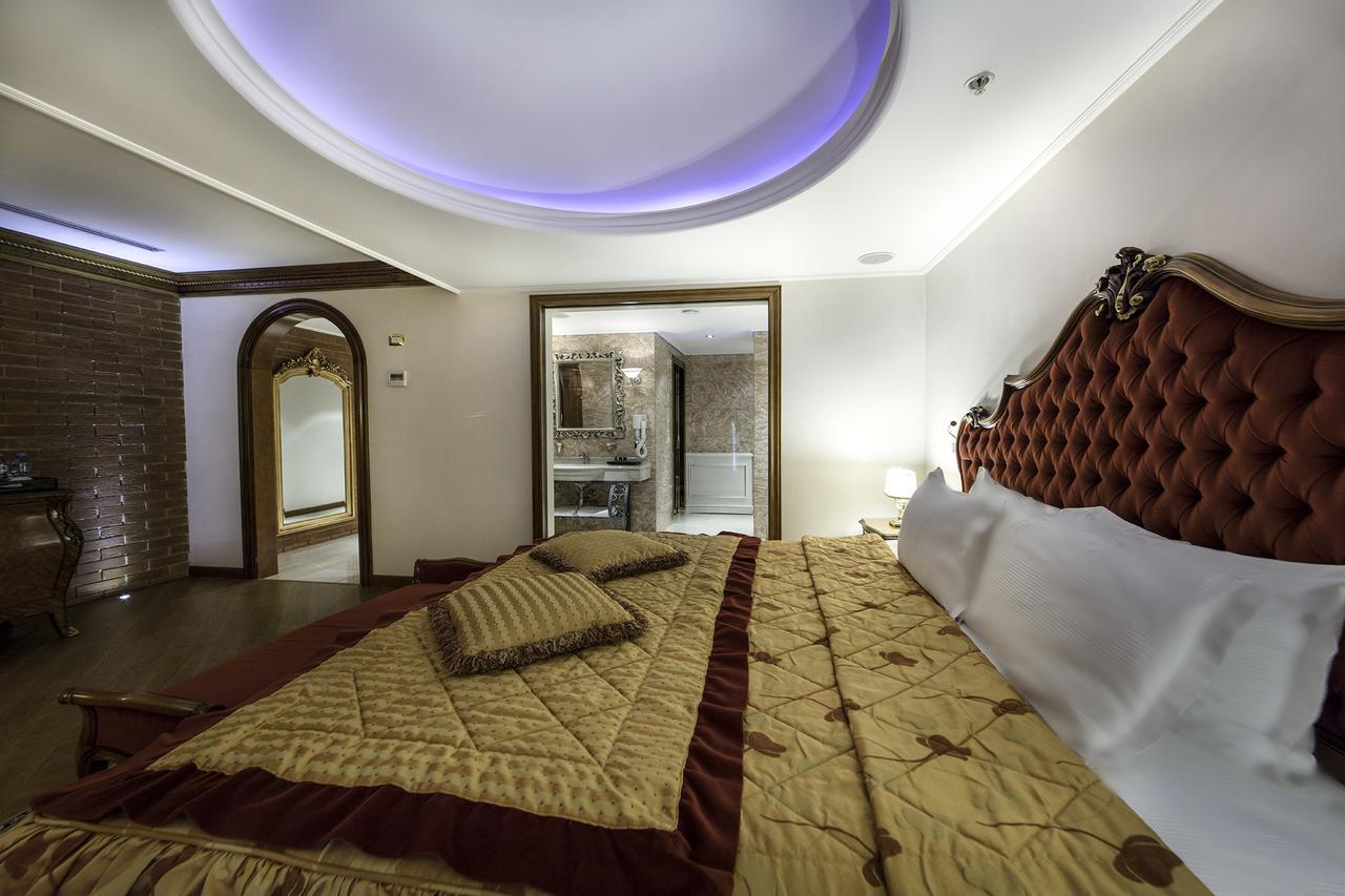 Xheko Imperial Luxury Hotel & Spa Tirana Exterior photo A room at the hotel
